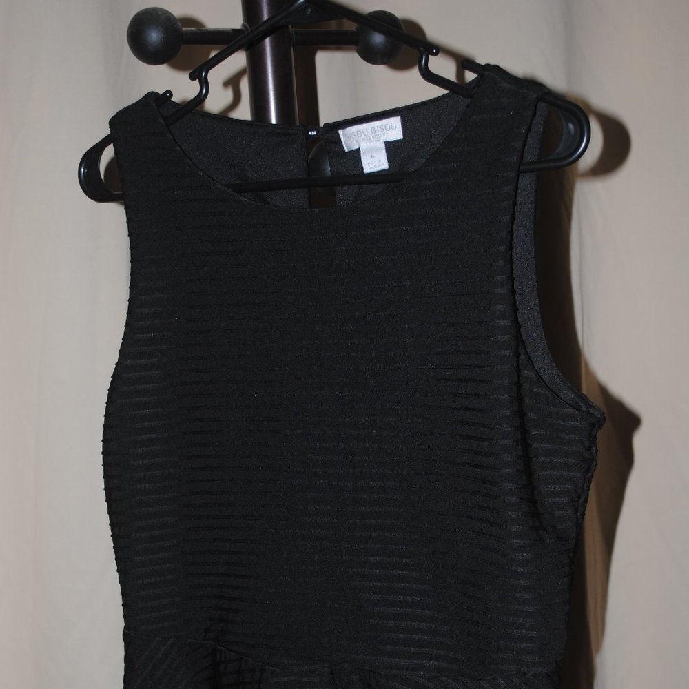 Sleeveless flare waist blouse